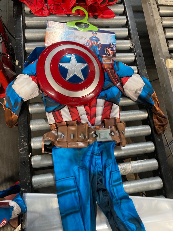 Photo 2 of MEDIUM 8-10 MARVEL’S CAPTAIN AMERICA HALLOWEEN COSTUME FOR KIDS - Deluxe Muscle Jumpsuit w/Printed Design + 3D Headpiece, Gloves & Shield
