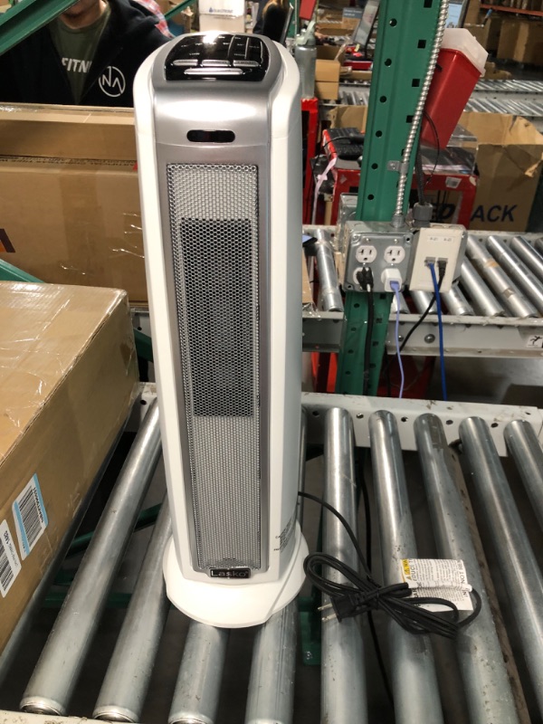 Photo 2 of **PARTS ONLY/NON-REFUNDABLE***
Lasko Oscillating Ceramic Tower Space Heater for Home with Overheat Protection, Timer, 22.5 Inches, Silver, 1500W, 5775 Silver 5775