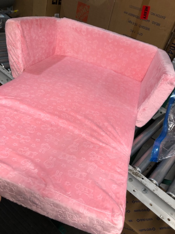 Photo 1 of Delta Children Cozee Flip-Out Sherpa 2-in-1 Convertible Sofa to Lounger for Kids, Pink