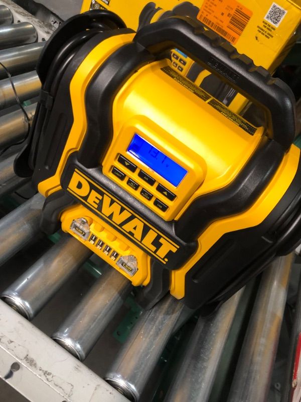 Photo 2 of DEWALT DXAEPS14 1600 Peak Battery Amp 12V Automotive Jump Starter/Power Station with 500 Watt AC Power Inverter, 120 PSI Digital Compressor, and USB Power , Yellow