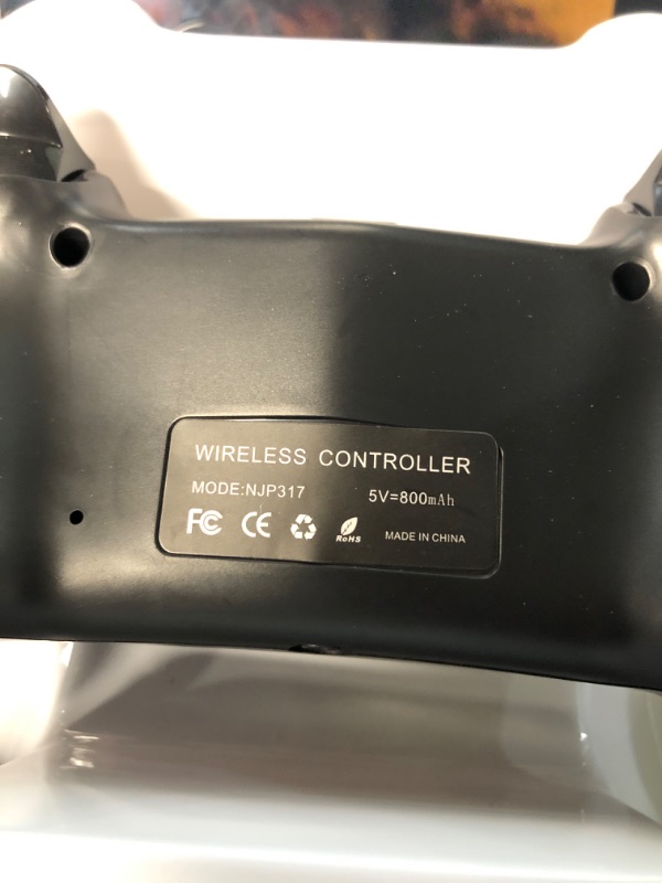 Photo 4 of **stock image is a reference only**  PS4 Controller Wireless with 1200mAh Battery/USB C Cable, Compatible with PS4/Slim/Pro/PC - Black