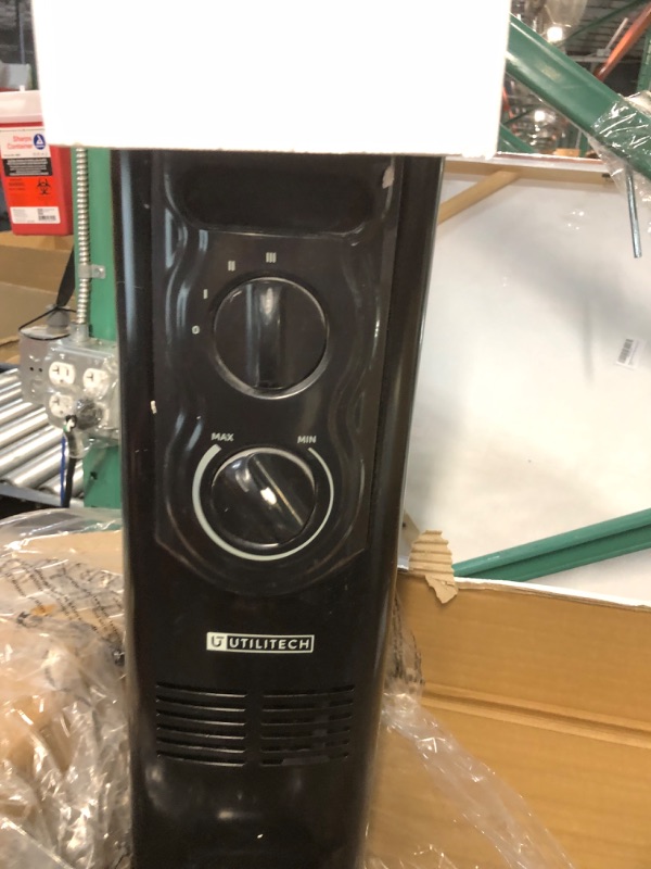 Photo 2 of ***PARTS ONLY NON REFUNDABLE***
Utilitech Up to 1500-Watt Oil-filled Radiant Utility Indoor Electric Space Heater with Thermostat
