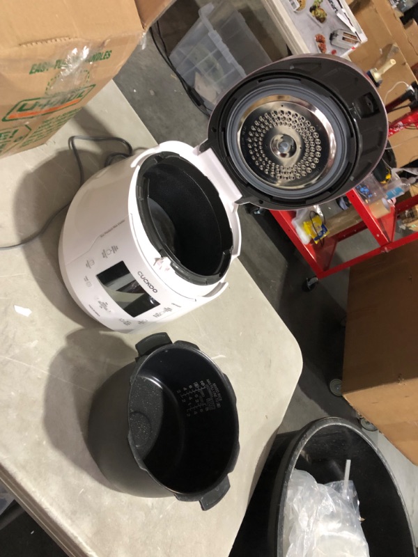 Photo 9 of ***MAJOR DAMAGE - BOTTOM CRACKED - POWERS ON - SEE PICTURES***
Cuckoo CRP-P1009SW 10 Cup Electric Heating Pressure Cooker & Warmer – (White), 12 Built-in Programs