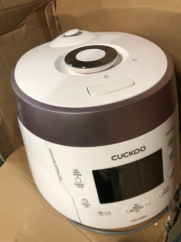 Photo 4 of ***MAJOR DAMAGE - BOTTOM CRACKED - POWERS ON - SEE PICTURES***
Cuckoo CRP-P1009SW 10 Cup Electric Heating Pressure Cooker & Warmer – (White), 12 Built-in Programs