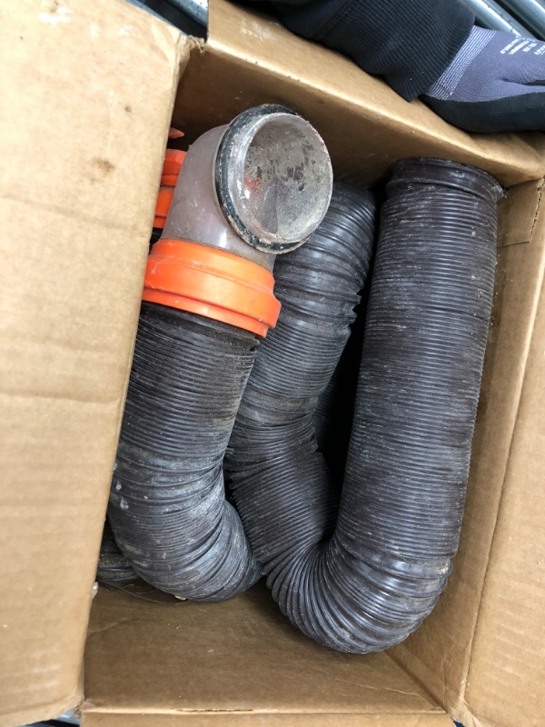 Photo 1 of Camco RhinoFLEX RV Sewer Hose Kit with Swivel Transparent Elbow and 4-in-1 Dump Station Fitting, Brown, 15 Feet (39770) 15ft Sewer Hose Kit Frustration-Free Packaging