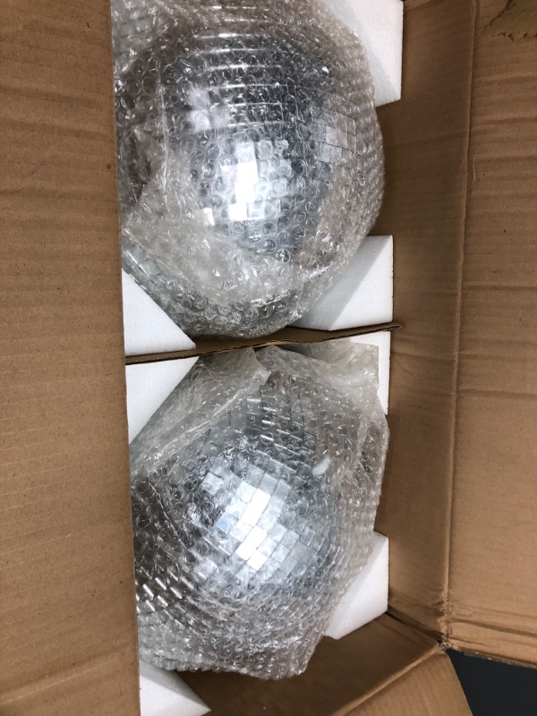 Photo 2 of 2 Pack Large Disco Ball Silver Hanging Mirror Disco Ball Reflective Mirror Disco Ball Ornament for Party Holiday Wedding Dance Music Festivals Decor Club Stage Props DJ Decoration (12 Inch, 12 Inch)