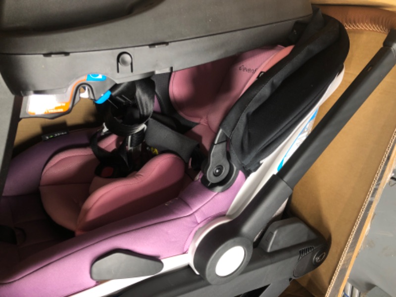 Photo 2 of Evenflo Gold Shyft DualRide with Carryall Storage Infant Car Seat and Stroller Combo (Opal Pink) Gold Shyft DualRide Opal Pink