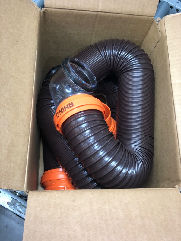 Photo 2 of Camco RhinoFLEX RV Sewer Hose Kit with Swivel Transparent Elbow and 4-in-1 Dump Station Fitting, Brown, 15 Feet (39770) 15ft Sewer Hose Kit Frustration-Free Packaging