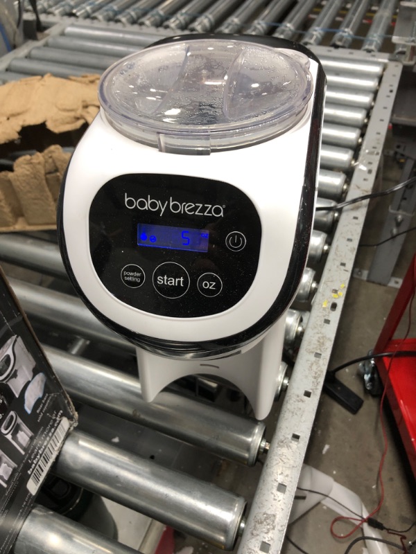 Photo 2 of Baby Brezza Formula Pro Mini Baby Formula Maker – Small Baby Formula Mixer Machine Fits Small Spaces and is Portable for Travel– Bottle Makers Makes The Perfect Bottle for Your Infant On The Go Formula Pro Mini Dispenser Machine