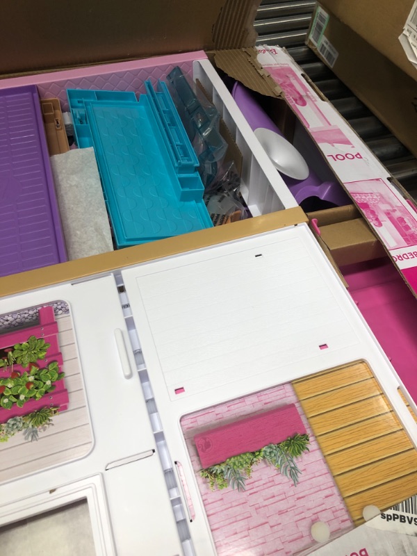 Photo 1 of Barbie Dreamhouse, Doll House Playset with 70+ Accessories Including Transforming Furniture, Elevator, Slide, Lights & Sounds Wheelchair Accessible Elevator