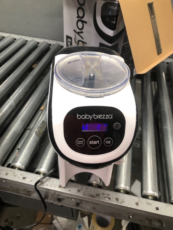 Photo 2 of Baby Brezza Formula Pro Mini Baby Formula Maker – Small Baby Formula Mixer Machine Fits Small Spaces and is Portable for Travel– Bottle Makers Makes The Perfect Bottle for Your Infant On The Go Formula Pro Mini Dispenser Machine