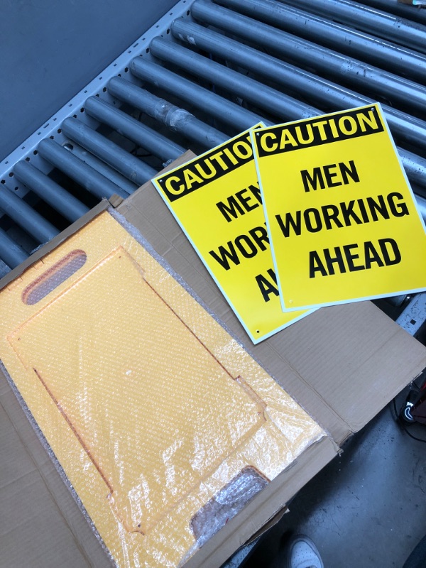 Photo 1 of SmartSign 25 x 12 inch “Caution - Men Working Ahead” Two-Sided Folding Floor Sign, Digitally Printed Polypropylene Plastic, Black and Yellow