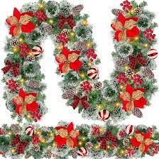 Photo 1 of [2 Pack & Timer 8 Modes] 9 Ft 100 LED Christmas Garland with Lights 5 Poinsettia 4 Balls 300 Thick Snowy Tips 18 Pinecones 198 Red Berries Battery Operated Garland Christmas Decorations Indoor Mantle