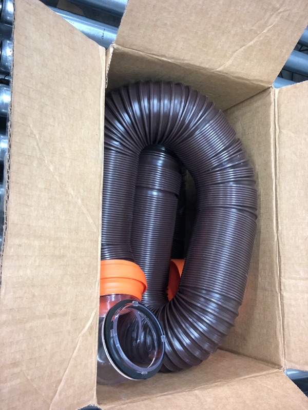 Photo 2 of Camco RhinoFLEX RV Sewer Hose Kit with Swivel Transparent Elbow and 4-in-1 Dump Station Fitting, Brown, 15 Feet (39770) 15ft Sewer Hose Kit Frustration-Free Packaging