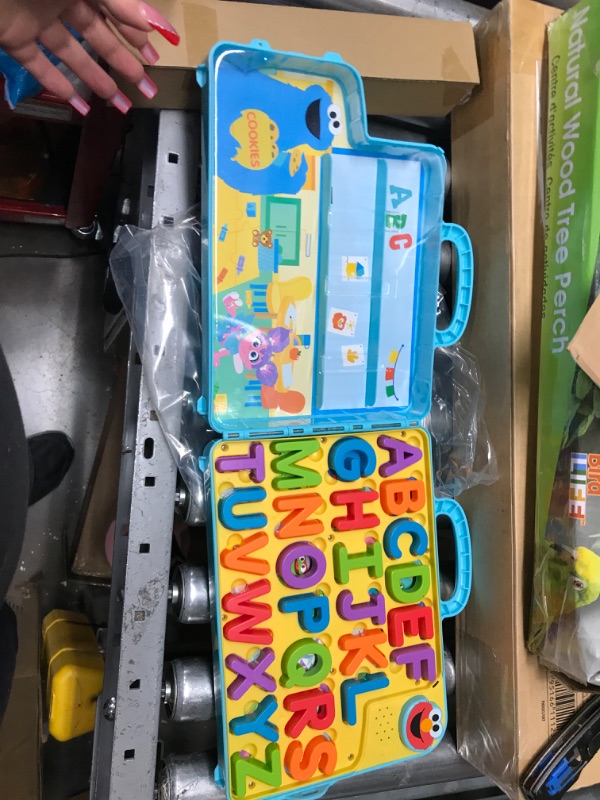 Photo 1 of Sesame Street Elmo’s Learning Letters Bus Activity Board, Preschool Learning and Education, Officially Licensed Kids Toys for Ages 2 Up, Gifts and Presents by Just Play