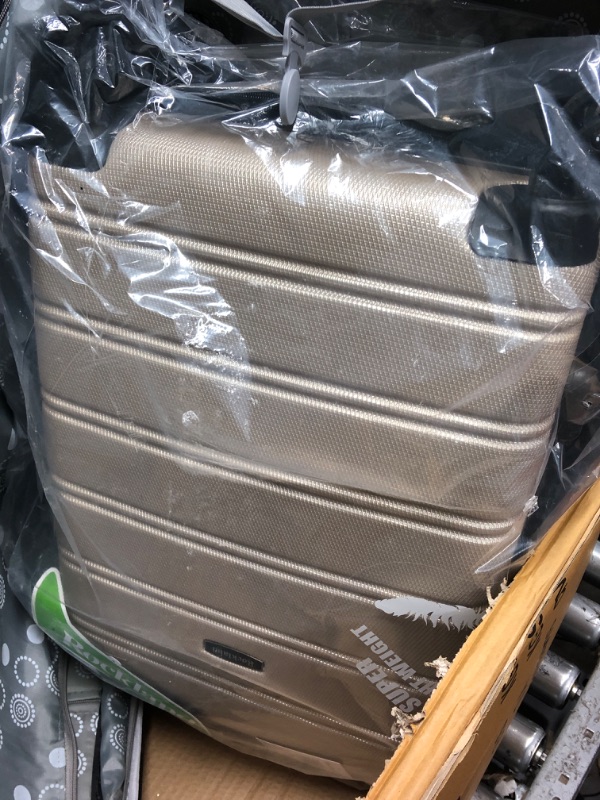 Photo 3 of **USED, HAS DAMAGE** Rockland Melbourne Hardside Expandable Spinner Wheel Luggage, Champagne, 2-Piece Set (20/28) 2-Piece Set (20/28) Champagne