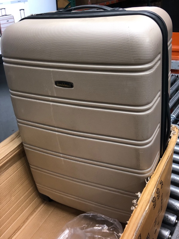 Photo 2 of **USED, HAS DAMAGE** Rockland Melbourne Hardside Expandable Spinner Wheel Luggage, Champagne, 2-Piece Set (20/28) 2-Piece Set (20/28) Champagne