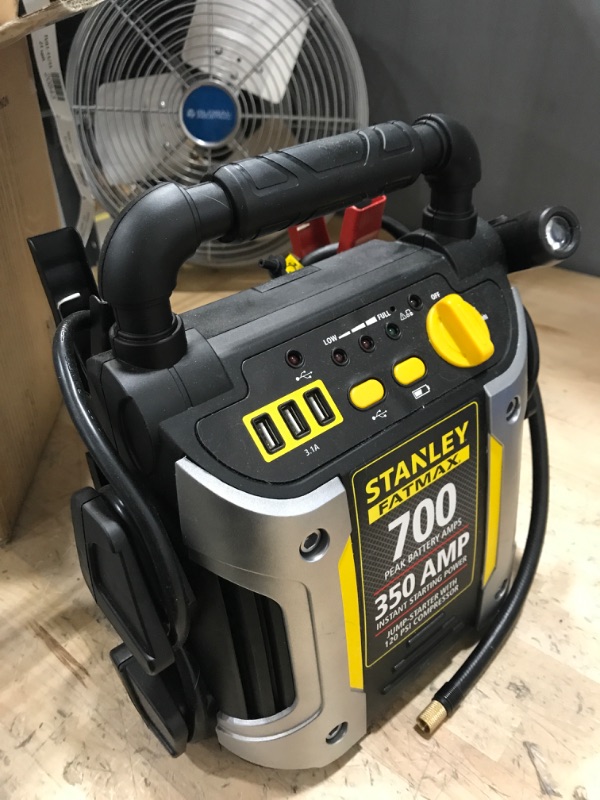 Photo 2 of * wont hold charge * sold for parts * 
STANLEY FATMAX J7CS Portable Power Station Jump Starter: 700 Peak/350 Instant Amps, 120 PSI Air Compressor, 3.1A USB Ports, Battery Clamps