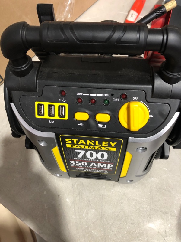 Photo 3 of * wont hold charge * sold for parts * 
STANLEY FATMAX J7CS Portable Power Station Jump Starter: 700 Peak/350 Instant Amps, 120 PSI Air Compressor, 3.1A USB Ports, Battery Clamps