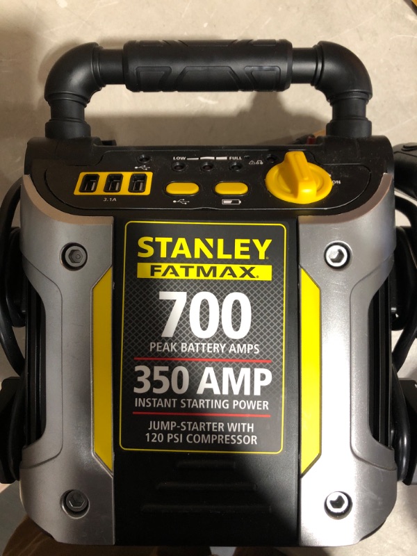 Photo 4 of * wont hold charge * sold for parts * 
STANLEY FATMAX J7CS Portable Power Station Jump Starter: 700 Peak/350 Instant Amps, 120 PSI Air Compressor, 3.1A USB Ports, Battery Clamps