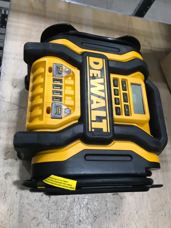 Photo 2 of DEWALT DXAEPS14 1600 Peak Battery Amp 12V Automotive Jump Starter/Power Station with 500 Watt AC Power Inverter, 120 PSI Digital Compressor, and USB Power , Yellow