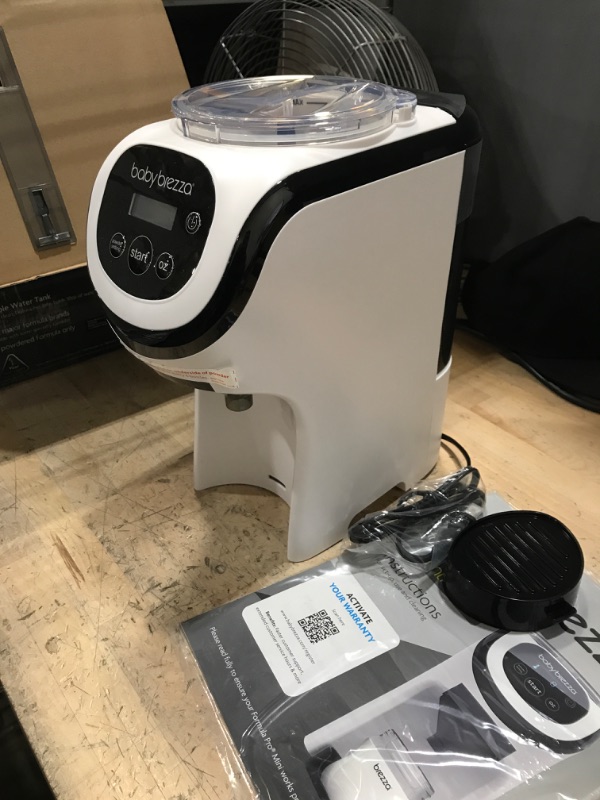 Photo 1 of Baby Brezza Formula Pro Mini Baby Formula Maker – Small Baby Formula Mixer Machine Fits Small Spaces and is Portable for Travel– Bottle Makers Makes The Perfect Bottle for Your Infant On The Go Formula Pro Mini Dispenser Machine