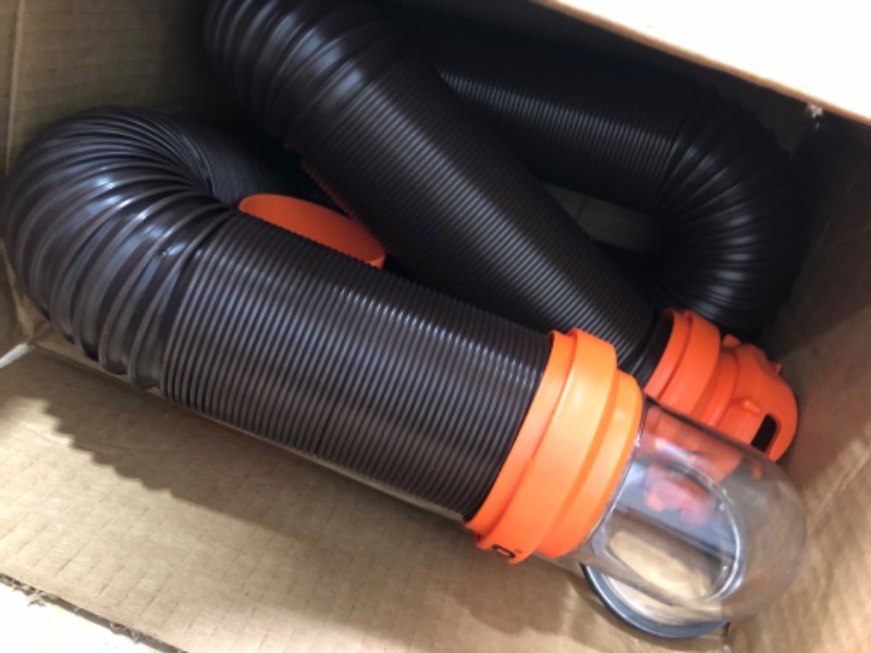 Photo 2 of Camco RhinoFLEX RV Sewer Hose Kit with Swivel Transparent Elbow and 4-in-1 Dump Station Fitting, Brown, 15 Feet (39770) 15ft Sewer Hose Kit Frustration-Free Packaging