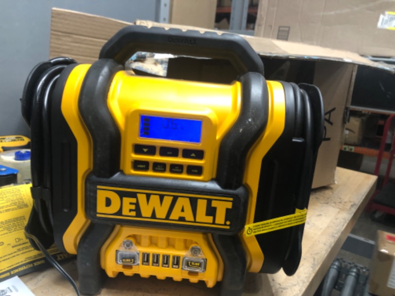 Photo 4 of **UNABLE TO TEST***
DEWALT DXAEPS14 1600 Peak Battery Amp 12V Automotive Jump Starter/Power Station with 500 Watt AC Power Inverter, 120 PSI Digital Compressor, and USB Power , Yellow
