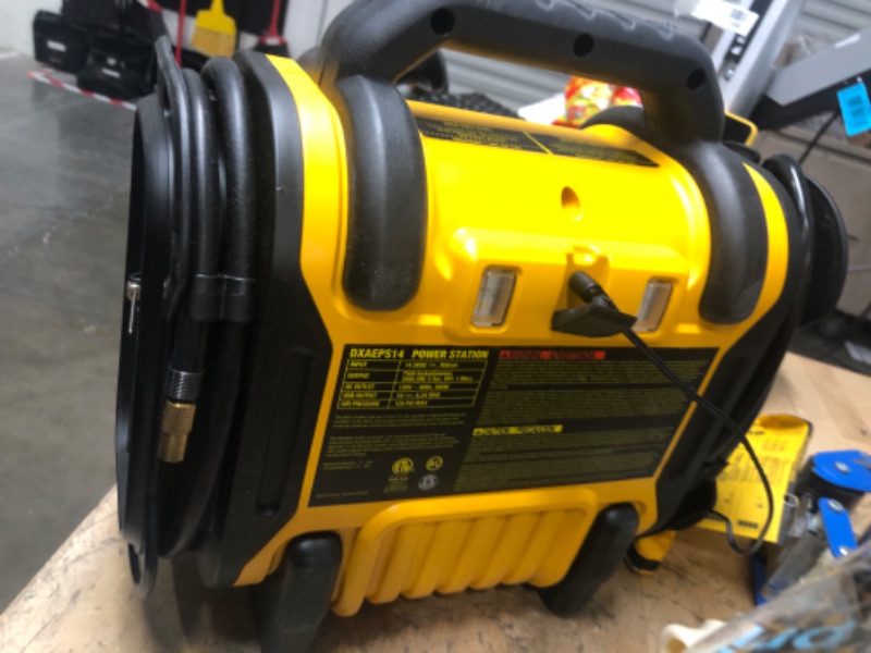 Photo 3 of **UNABLE TO TEST***
DEWALT DXAEPS14 1600 Peak Battery Amp 12V Automotive Jump Starter/Power Station with 500 Watt AC Power Inverter, 120 PSI Digital Compressor, and USB Power , Yellow
