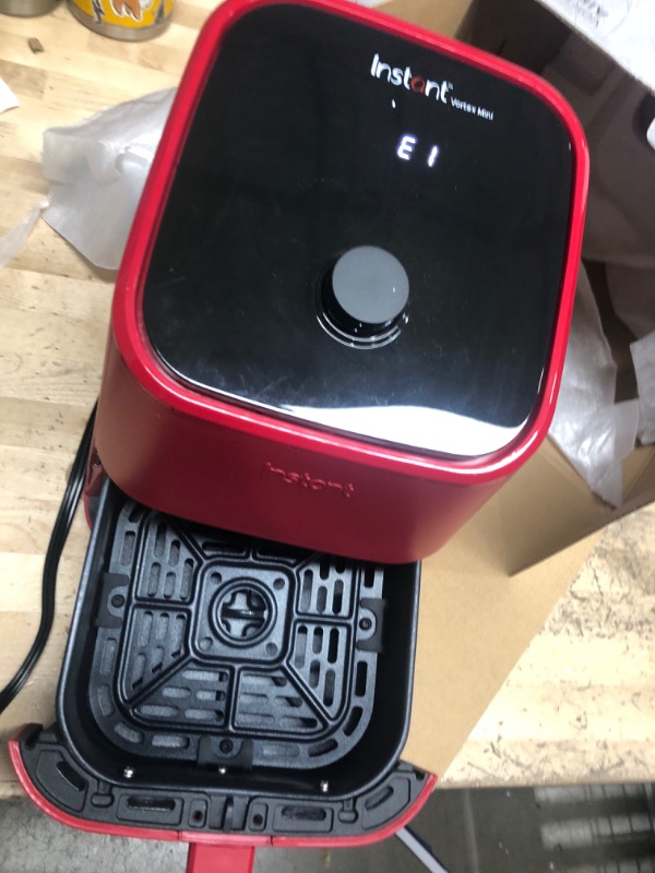 Photo 2 of **SCREEN DISPLAYS  " E1" MESSAGE**
Instant Vortex 4-in-1, 2-QT Mini Air Fryer Oven Combo, From the Makers of Instant Pot with Customizable Smart Cooking Programs, Nonstick and Dishwasher-Safe Basket, App with over 100 Recipes, Red