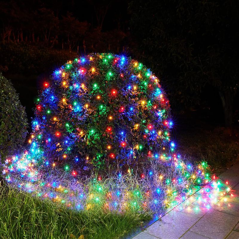 Photo 1 of BlcTec Christmas Net Lights 200 LED 8.2ft x 4.9ft Multicolor Outdoor Christmas Decorations Lights with 8 Modes, Timer, Connectable, Waterproof and Durable Green Wire for Trees, Bushes, Yard Xmas Décor
