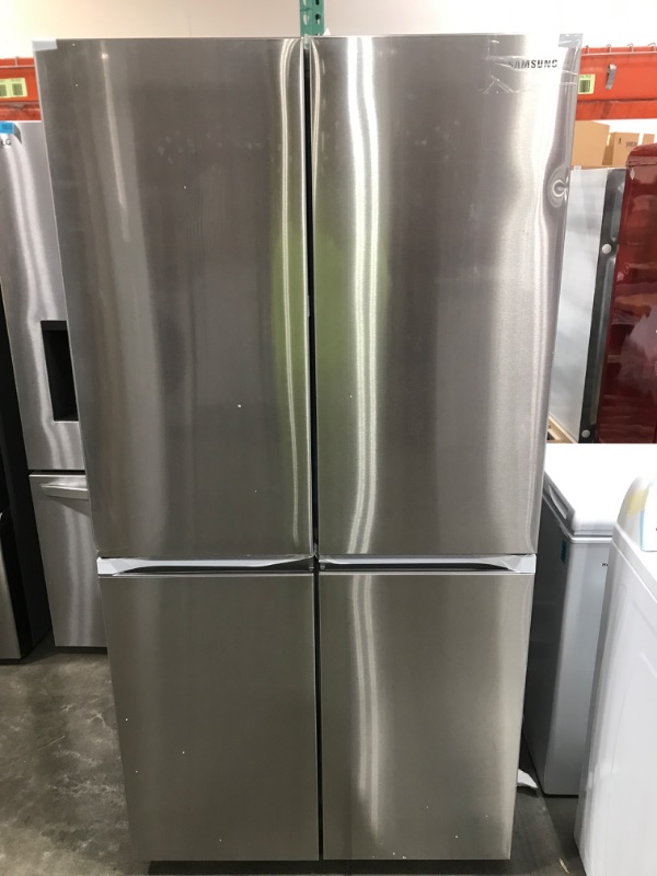 Photo 2 of DENTED EDGE**Samsung 22.8-cu ft 4-Door Counter-depth Smart French Door Refrigerator with Dual Ice Maker and Door within Door (Fingerprint Resistant Stainless Steel) 