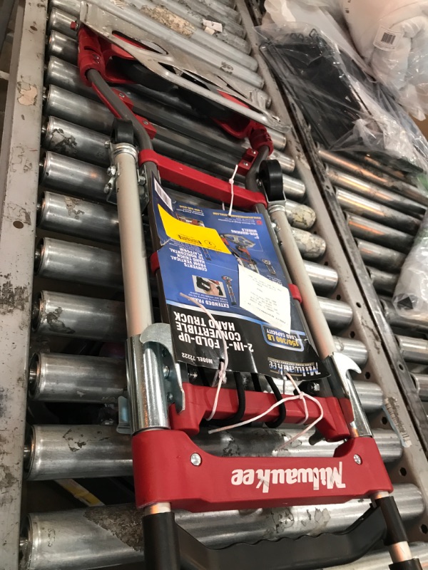 Photo 2 of ***DAMAGED - WON'T UNFOLD - SEE NOTES***
Milwaukee 150-lb. Vertical & 300-Lb. Horizontal Capacity Folding Convertible Hand Truck - Each 72222