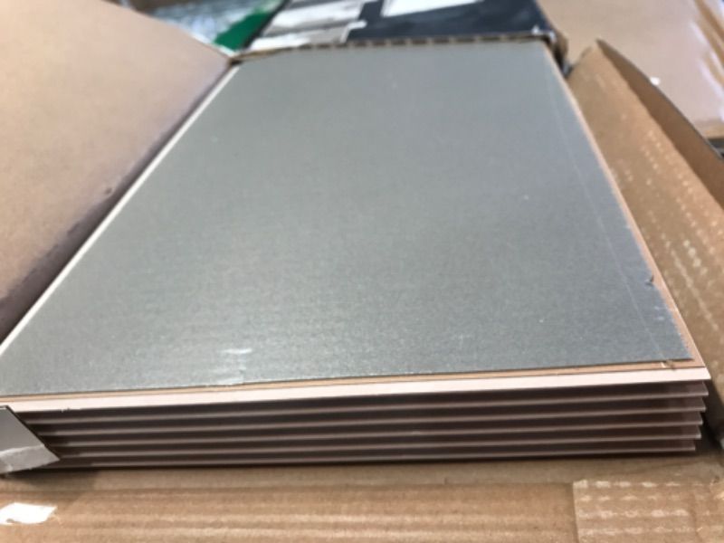 Photo 1 of 4 of- STAINMASTER Aubrey Oak 12-mil x 9-in W x 60-in L Waterproof and Water Resistant Interlocking Luxury Vinyl Plank Flooring (22.53-sq ft/ Carton)

