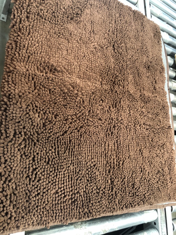 Photo 1 of 3' x 5' brown shagged rug 