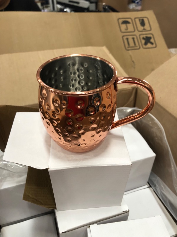 Photo 2 of  Moscow Mule Copper Mugs Set of 24 (16oz) | Food Grade Cups | Handcrafted w/Lacquered Hammered Finish, Smooth Rounded Lip, Ergonomic Handle  w/Solid Grip
