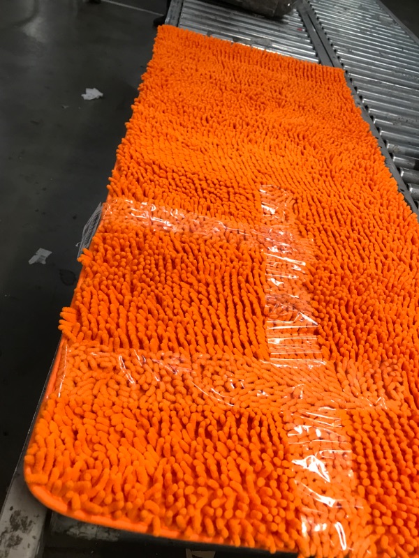 Photo 1 of 2' x 4'10" orange shagged runner rug 