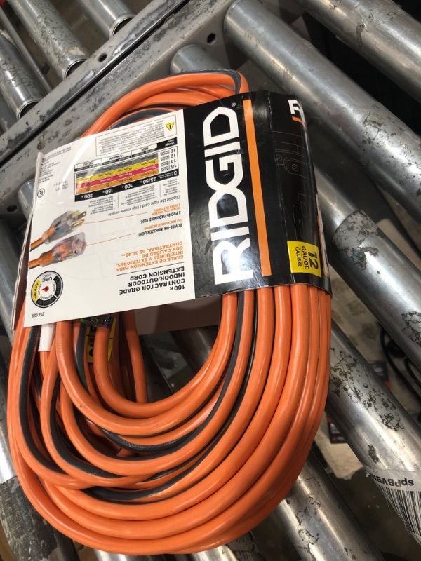 Photo 2 of RIDGID 100 ft. 12/3 Heavy Duty Indoor/Outdoor Extension Cord with Lighted End, Orange/Grey