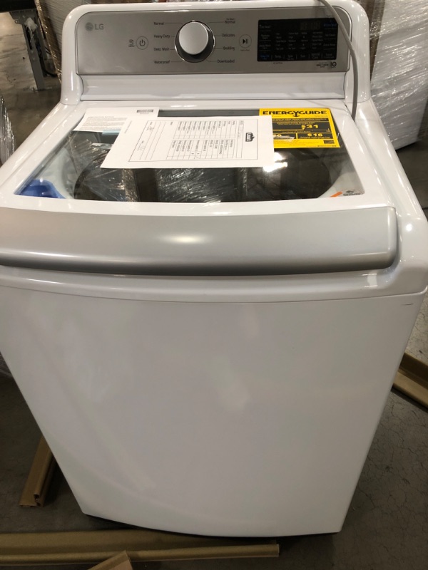 Photo 2 of LG WT7405CW 5.3 Cu. Ft. White Top Load Washer with 4-Way Agitator & TurboWash3D Technology