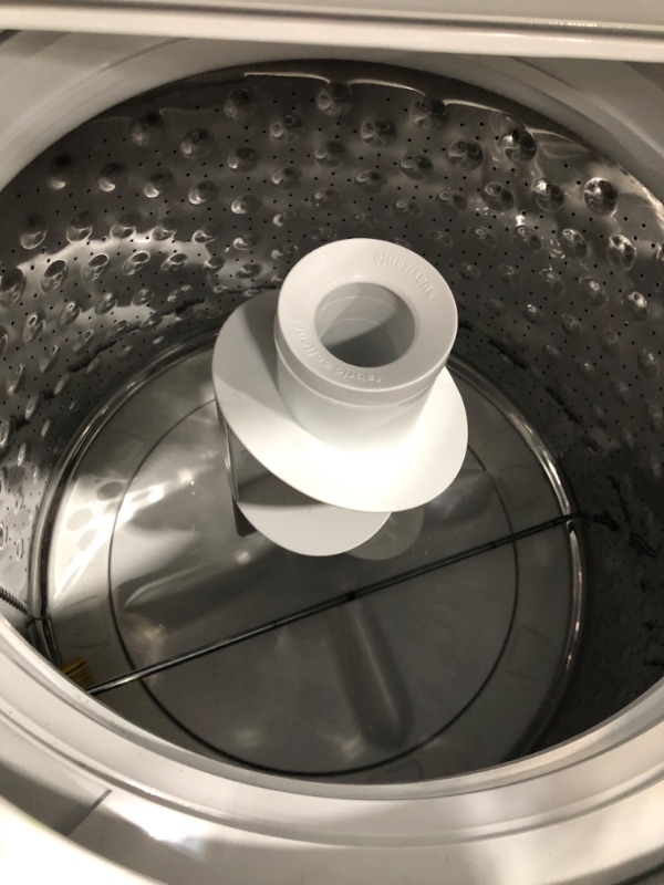 Photo 2 of GE Unitized Spacemaker® 3.8 cu. ft. Capacity Washer with Stainless Steel Basket and 5.9 cu. ft. Capacity Gas Dryer