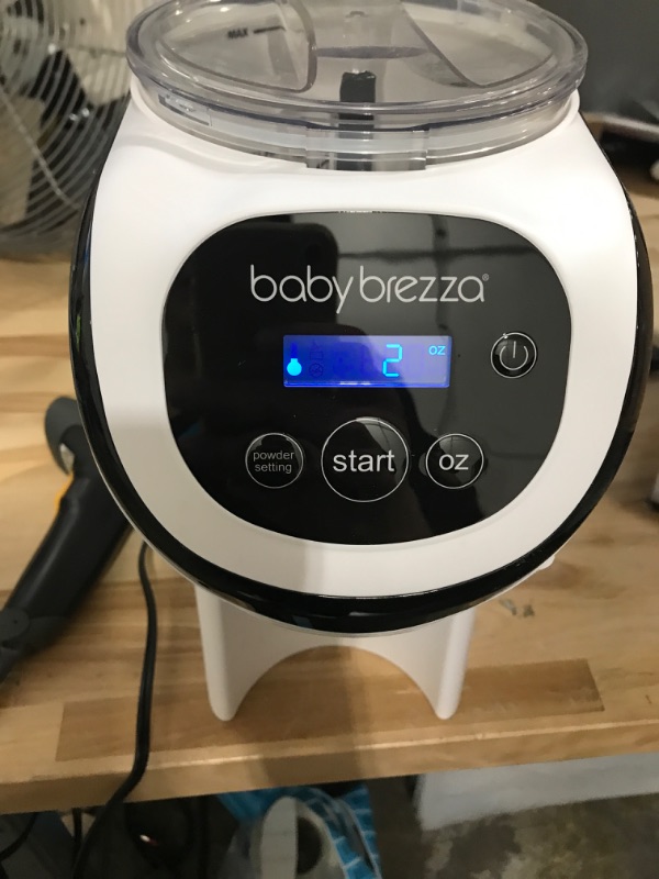 Photo 2 of Baby Brezza Formula Pro Mini Baby Formula Maker – Small Baby Formula Mixer Machine Fits Small Spaces and is Portable for Travel– Bottle Makers Makes The Perfect Bottle for Your Infant On The Go Formula Pro Mini Dispenser Machine