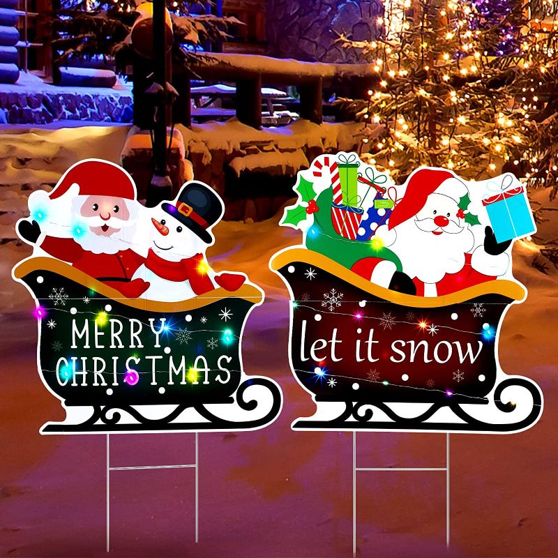 Photo 1 of 2 Pcs Christmas Yard Decorations Metal Sleigh Stakes Outside Christmas Decorations Decorative Garden Stakes Snowman and Santa Claus Yard Signs with Light Strings for Outdoor Xmas Holiday Garden Lawn