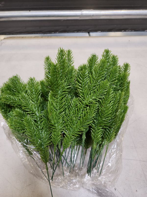 Photo 1 of 60 Pcs Christmas Artificial Pine Branches Faux Cedar Picks Floral Sprays 11 x 5.5 Inch Glitter Greenery Stems Pine Needles Twig for Xmas Vase Filler Home Garland DIY Wreath Decoratio