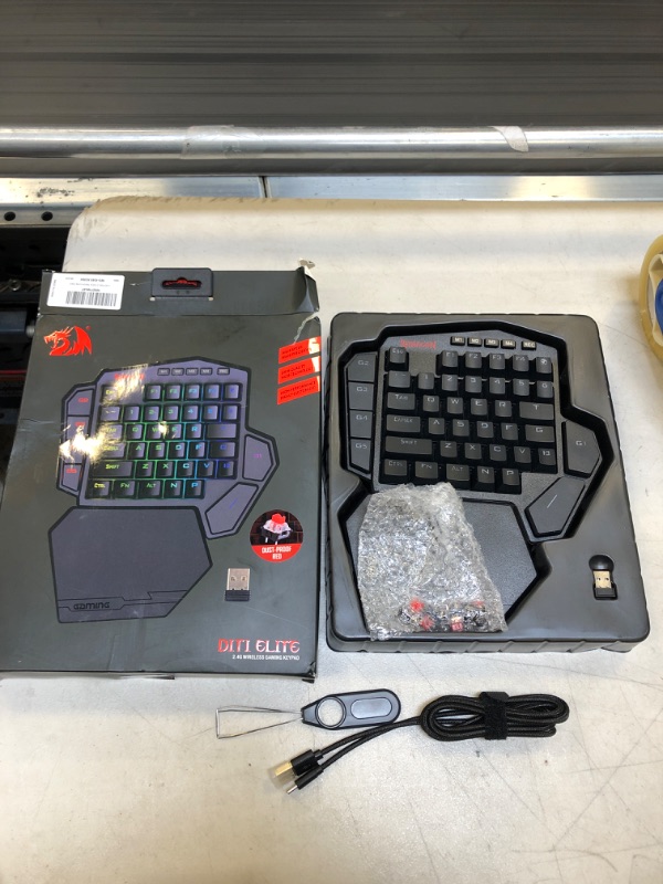 Photo 1 of Redragon K585 DITI Wireless One-Handed Mechanical Keyboard, 42 Keys 2.4Ghz RGB 40% Gaming Keypad with 7 Onboard Macro Keys, Detachable Wrist Support, Durable Battery (Red Switch)