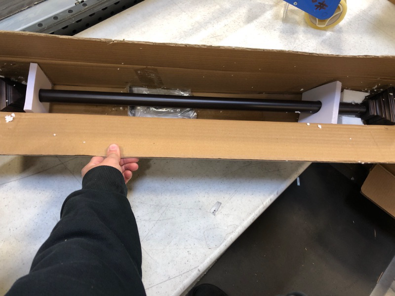 Photo 1 of adjustable curtain rod