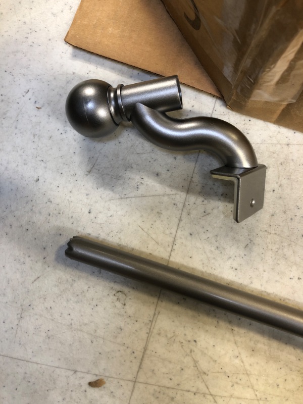 Photo 1 of adjustable curtain rod