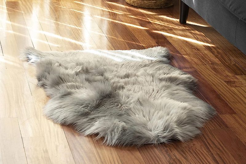 Photo 1 of Silky Soft Faux Fur Rug, 2 ft. x 3 ft. Gray Fluffy Rug, Sheepskin Area Rug, Shaggy Rug for Living Room, Bedroom, Kid's Room, or Nursery, Home Décor Accent, Machine Washable with Non-Slip Backing / STOCK PHOTO IS FOR REFERENCE ONLY 
