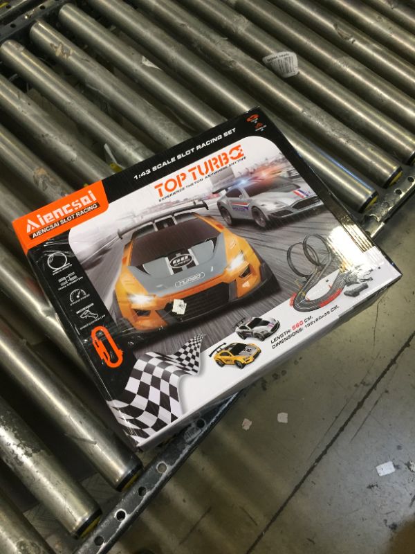 Photo 1 of Electric High-Speed Slot Car Race Car Track Sets with 2 1:43 Scale Slot Cars and 2 Hand Controllers with Headlights and Dual Racing, Toys Gifts for 6 7 8 9 10 11 12 Boys Girls