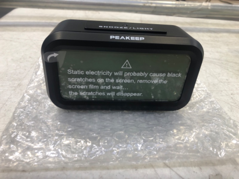 Photo 1 of PEAKEEP Smart Night Light Digital Alarm Clock with Indoor Temperature, Battery Operated Desk Small Clock (Black)