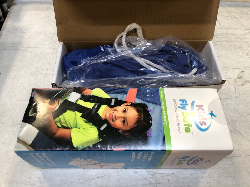 Photo 2 of Cares FAA Approved Airplane Harness for Kids - Toddler Travel Restraint Seat Belt - Provides Car Seat Safety for Children on Flights - Light Weight, Easy to Store and Installs in Minutes.